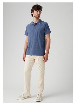 Levi&apos;s Spodnie chino w kolorze kremowym ze sklepu Limango Polska w kategorii Spodnie męskie - zdjęcie 187639572