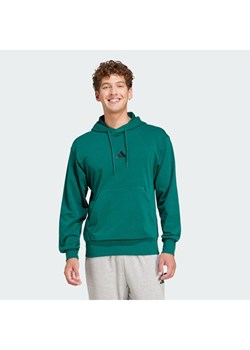 adidas Bluza Essentials Feel Cozy JE3841 Zielony Regular Fit ze sklepu MODIVO w kategorii Bluzy męskie - zdjęcie 187673291