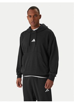 adidas Bluza Essentials Feel Cozy JE3849 Czarny Regular Fit ze sklepu MODIVO w kategorii Bluzy męskie - zdjęcie 187803092