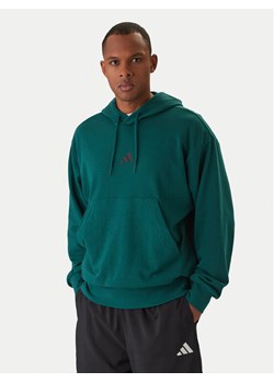 adidas Bluza Essentials Feel Cozy JE3841 Zielony Regular Fit ze sklepu MODIVO w kategorii Bluzy męskie - zdjęcie 187828100