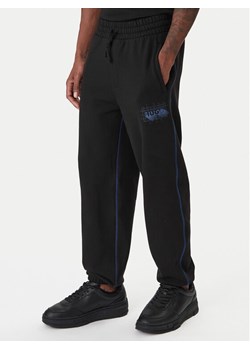 HUGO Spodnie dresowe Notharos 50553508 Czarny Regular Fit ze sklepu MODIVO w kategorii Spodnie męskie - zdjęcie 187828164