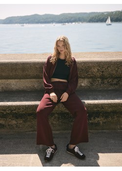 Reserved - Spodnie z szeroką nogawką - bordowy ze sklepu Reserved w kategorii Spodnie damskie - zdjęcie 187831690