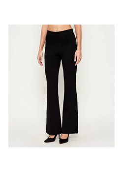 GUESS Spodnie NOEL | flare fit ze sklepu Gomez Fashion Store w kategorii Spodnie damskie - zdjęcie 187914673