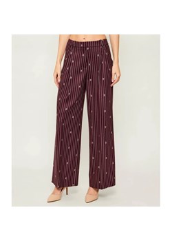 HUGO Spodnie Haviri | flare fit ze sklepu Gomez Fashion Store w kategorii Spodnie damskie - zdjęcie 187926724