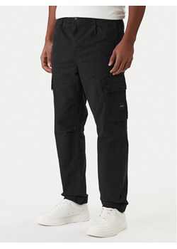 BOSS Spodnie materiałowe Sisla-9-Cargo 50552096 Czarny Regular Fit ze sklepu MODIVO w kategorii Spodnie męskie - zdjęcie 187931670