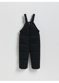 Reserved - Gumowane spodnie na szelkach - czarny ze sklepu Reserved w kategorii Spodnie dziewczęce - zdjęcie 187932850