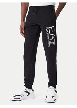 EA7 Emporio Armani Spodnie dresowe 7M001415 AF22266 UC001 Czarny Regular Fit ze sklepu MODIVO w kategorii Spodnie męskie - zdjęcie 187934083