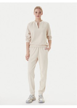 EA7 Emporio Armani Dres 7W000976 AF12501 U1088 Beżowy Regular Fit ze sklepu MODIVO w kategorii Dresy damskie - zdjęcie 187934144