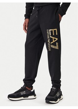 EA7 Emporio Armani Spodnie dresowe 7M001415 AF22266 MC004 Czarny Regular Fit ze sklepu MODIVO w kategorii Spodnie męskie - zdjęcie 187934200
