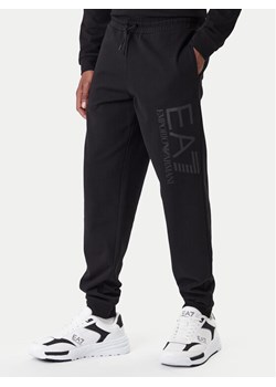 EA7 Emporio Armani Spodnie dresowe 7M001415 AF22266 MC005 Czarny Regular Fit ze sklepu MODIVO w kategorii Spodnie męskie - zdjęcie 187934240