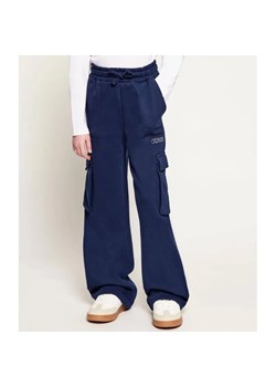 Guess Spodnie dresowe | flare fit ze sklepu Gomez Fashion Store w kategorii Spodnie dziewczęce - zdjęcie 187944051