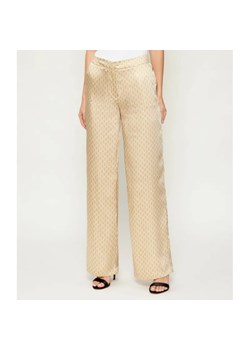 Marciano Guess Satynowe spodnie ELIDA | Loose fit ze sklepu Gomez Fashion Store w kategorii Spodnie damskie - zdjęcie 187946444