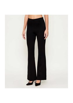 GUESS Spodnie NOEL | flare fit ze sklepu Gomez Fashion Store w kategorii Spodnie damskie - zdjęcie 187957184