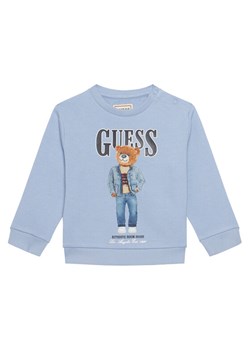Guess Bluza N6RQ03 KAD74 Błękitny Regular Fit ze sklepu MODIVO w kategorii T-shirty chłopięce - zdjęcie 187962681