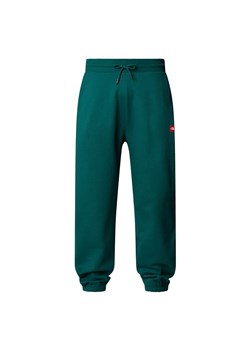 Spodnie męskie The North Face AXYS 0A8C1U6GI1 - zielone ze sklepu streetstyle24.pl w kategorii Spodnie męskie - zdjęcie 187963750