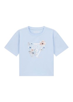 Guess T-Shirt J6RI32 K6YW4 Błękitny Regular Fit ze sklepu MODIVO w kategorii Bluzki dziewczęce - zdjęcie 187964491