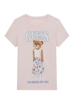 Guess T-Shirt J6RI10 K6YW4 Różowy Regular Fit ze sklepu MODIVO w kategorii Bluzki dziewczęce - zdjęcie 187966830