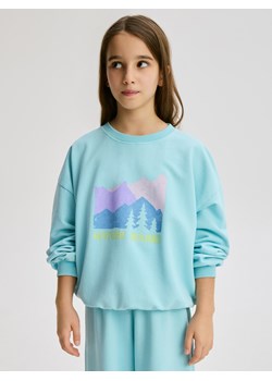 Reserved - Bawełniana koszulka z nadrukiem - jasnoturkusowy ze sklepu Reserved w kategorii Bluzki dziewczęce - zdjęcie 187968990