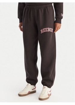 Reebok Spodnie dresowe Marvs RK25165CCW Brązowy Regular Fit ze sklepu MODIVO w kategorii Spodnie damskie - zdjęcie 187971392
