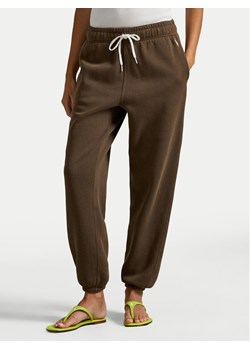 Polo Ralph Lauren Spodnie dresowe 211971700506 Brązowy Tapered Fit ze sklepu MODIVO w kategorii Spodnie damskie - zdjęcie 187976031