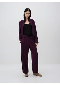 Reserved - Spodnie z dodatkiem wiskozy - ciemnofioletowy ze sklepu Reserved w kategorii Spodnie damskie - zdjęcie 187983084