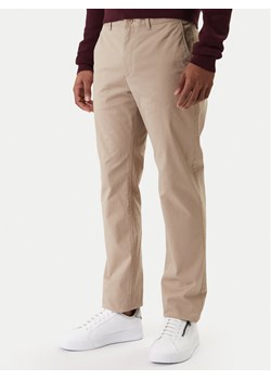 Tommy Hilfiger Chinosy Denton Essential MW0MW40262 Beżowy Straight Fit ze sklepu MODIVO w kategorii Spodnie męskie - zdjęcie 187989242