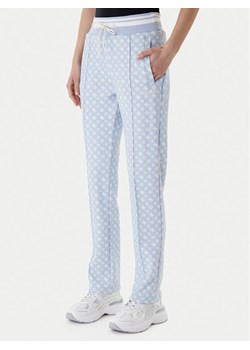 Guess Spodnie dresowe V5YB20 KB212 Błękitny Regular Fit ze sklepu MODIVO w kategorii Spodnie damskie - zdjęcie 187992532