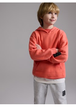Reserved - Bawełniana bluza z kapturem - koralowy ze sklepu Reserved w kategorii Bluzy chłopięce - zdjęcie 187996961