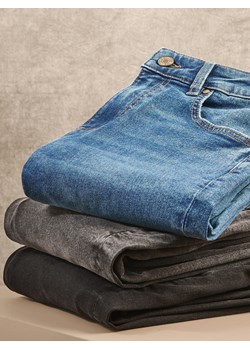 Reserved - Jeansy slim z dłuższą nogawką - szary ze sklepu Reserved w kategorii Jeansy damskie - zdjęcie 187997292