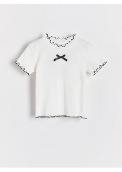 Reserved - Bawełniana bluzka z kokardą - wielobarwny ze sklepu Reserved w kategorii Bluzki dziewczęce - zdjęcie 188001310