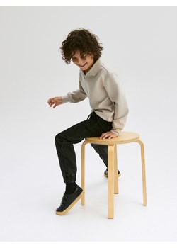 Reserved - Elastyczne jeansy jogger - czarny ze sklepu Reserved w kategorii Spodnie chłopięce - zdjęcie 188002820