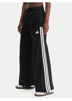 adidas Spodnie dresowe House Of Tiro KD4299 Czarny Wide Leg ze sklepu MODIVO w kategorii Spodnie damskie - zdjęcie 188005541