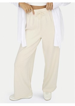 ONLY Spodnie dresowe Scarlett 15346400 Écru Regular Fit ze sklepu MODIVO w kategorii Spodnie damskie - zdjęcie 188013631