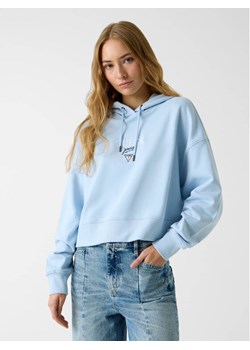 Guess Jeans Bluza 180725 Błękitny Classic Fit ze sklepu MODIVO w kategorii Bluzy damskie - zdjęcie 188020511