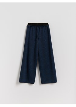 Reserved - Luźne spodnie w kratę - wielobarwny ze sklepu Reserved w kategorii Spodnie dziewczęce - zdjęcie 188028850