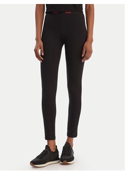 HUGO Legginsy 50556812 Czarny Slim Fit ze sklepu MODIVO w kategorii Spodnie damskie - zdjęcie 188037211