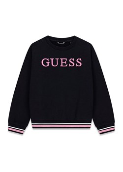 Guess Kids Sukienka 180747 Różowy Classic Fit ze sklepu MODIVO w kategorii Sukienki dziewczęce - zdjęcie 188051614