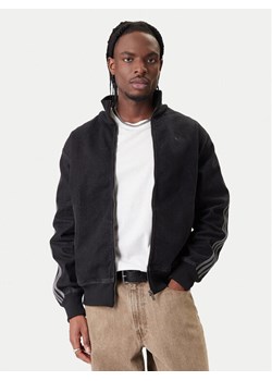 adidas Bluza adicolor Denim Firebird KD1516 Czarny Loose Fit ze sklepu MODIVO w kategorii Bluzy męskie - zdjęcie 188062122