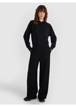 Damskie spodnie dresowe 4F 4FWAW25TTROF1181 - czarne ze sklepu Sportstylestory.com w kategorii Spodnie damskie - zdjęcie 188069121