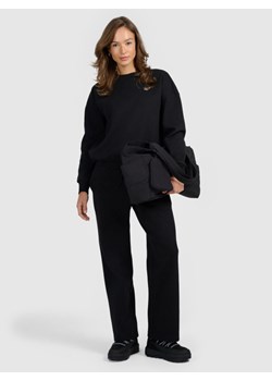 Damskie spodnie dresowe z szerokimi nogawkami 4F 4FRAW25TTROF1919 - czarne ze sklepu Sportstylestory.com w kategorii Spodnie damskie - zdjęcie 188069513