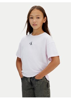 Calvin Klein Jeans T-Shirt Logo IG0IG02136 Różowy Boxy Fit ze sklepu MODIVO w kategorii Bluzki dziewczęce - zdjęcie 188074504