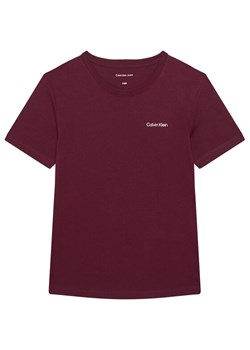 Calvin Klein Jeans T-Shirt IU0IU00683 Fioletowy Regular Fit ze sklepu MODIVO w kategorii T-shirty chłopięce - zdjęcie 188074732