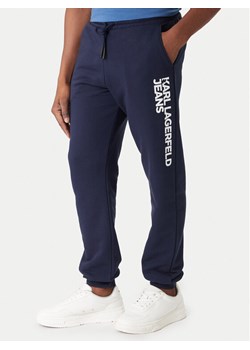 Karl Lagerfeld Jeans Spodnie dresowe A1M10001 Granatowy Slim Fit ze sklepu MODIVO w kategorii Spodnie męskie - zdjęcie 188075010