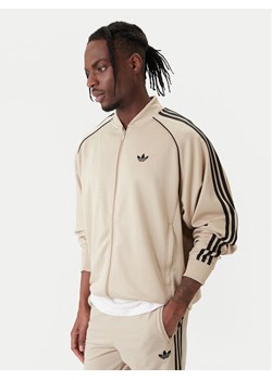 adidas Bluza adicolor SST Classic KC8524 Beżowy Loose Fit ze sklepu MODIVO w kategorii Bluzy męskie - zdjęcie 188075070