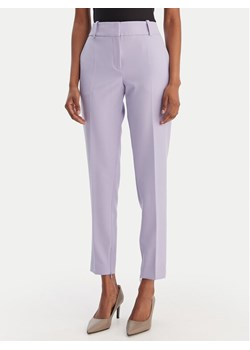HUGO Spodnie materiałowe Hedima-1 50544742 Fioletowy Slim Fit ze sklepu MODIVO w kategorii Spodnie damskie - zdjęcie 188081362