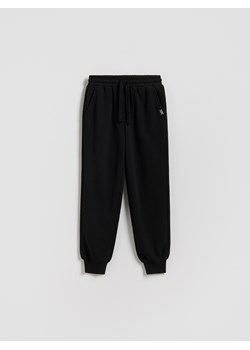 Reserved - Bawełniane spodnie jogger - czarny ze sklepu Reserved w kategorii Spodnie chłopięce - zdjęcie 188083722