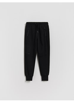 Reserved - Bawełniane spodnie jogger - czarny ze sklepu Reserved w kategorii Spodnie chłopięce - zdjęcie 188090504