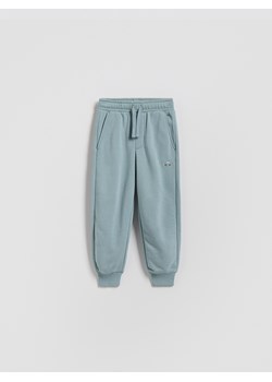 Reserved - Bawełniane spodnie jogger - jasnoniebieski ze sklepu Reserved w kategorii Spodnie chłopięce - zdjęcie 188090703
