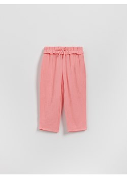 Reserved - Muślinowe spodnie - różowy ze sklepu Reserved w kategorii Spodnie dziewczęce - zdjęcie 188093813