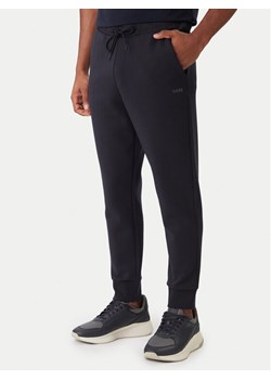 BOSS Spodnie dresowe Hadiko 50506141 Granatowy Regular Fit ze sklepu MODIVO w kategorii Spodnie męskie - zdjęcie 188095541